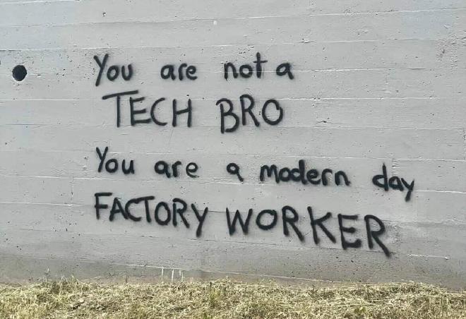 Radical graffiti stating &lsquo;you are not a tech bro you are a modern day factory worker&rsquo;